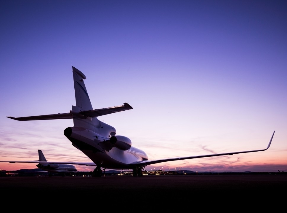 Private jets on airport ramp