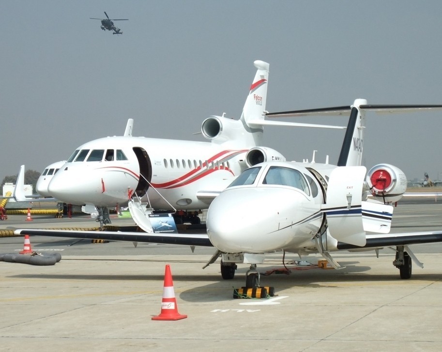 Large and Small Private Jet side by side