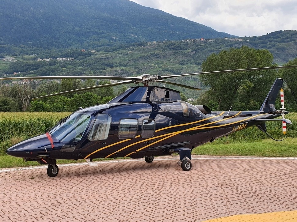 An Italy-based Agusta A109S turbine helicopter at the heliport