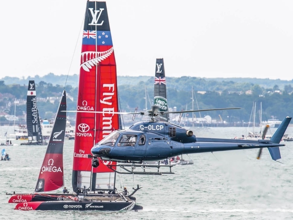 Helicopter filming a sailing race