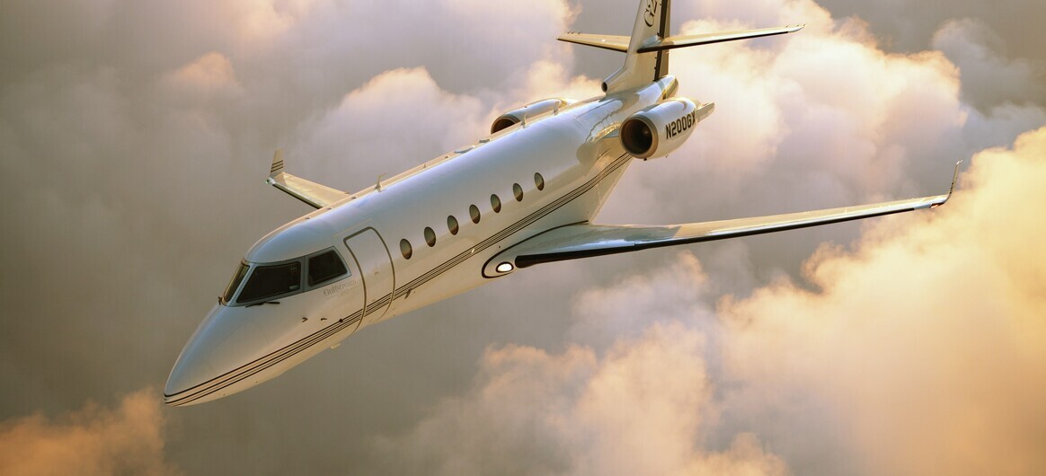 Gulfstream G200 flying above the clouds