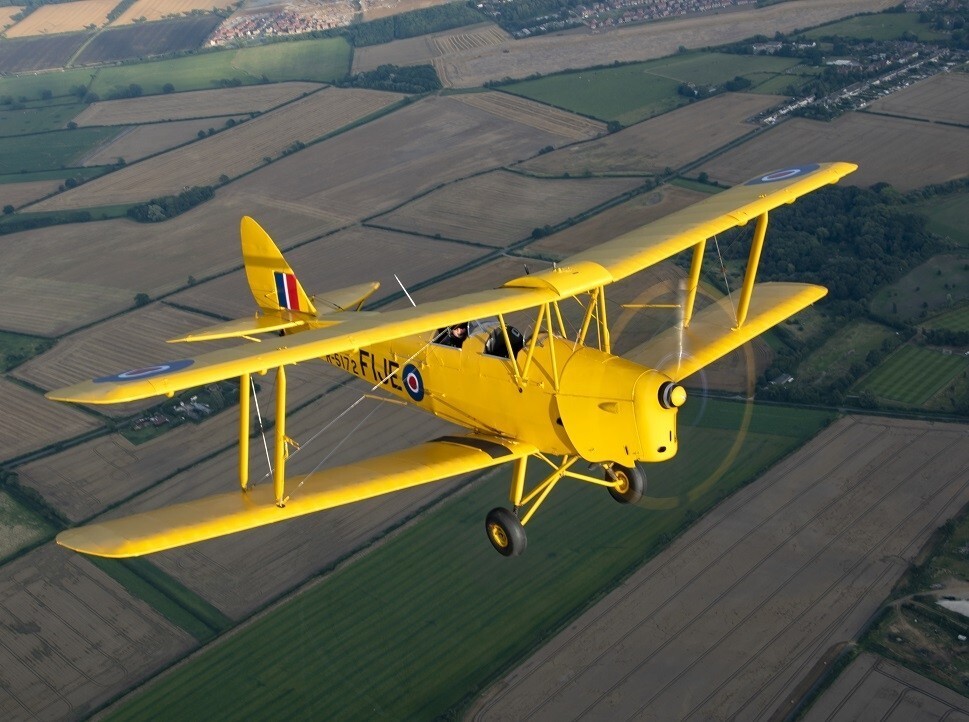 Vintage Tiger Moth aircraft aerial view