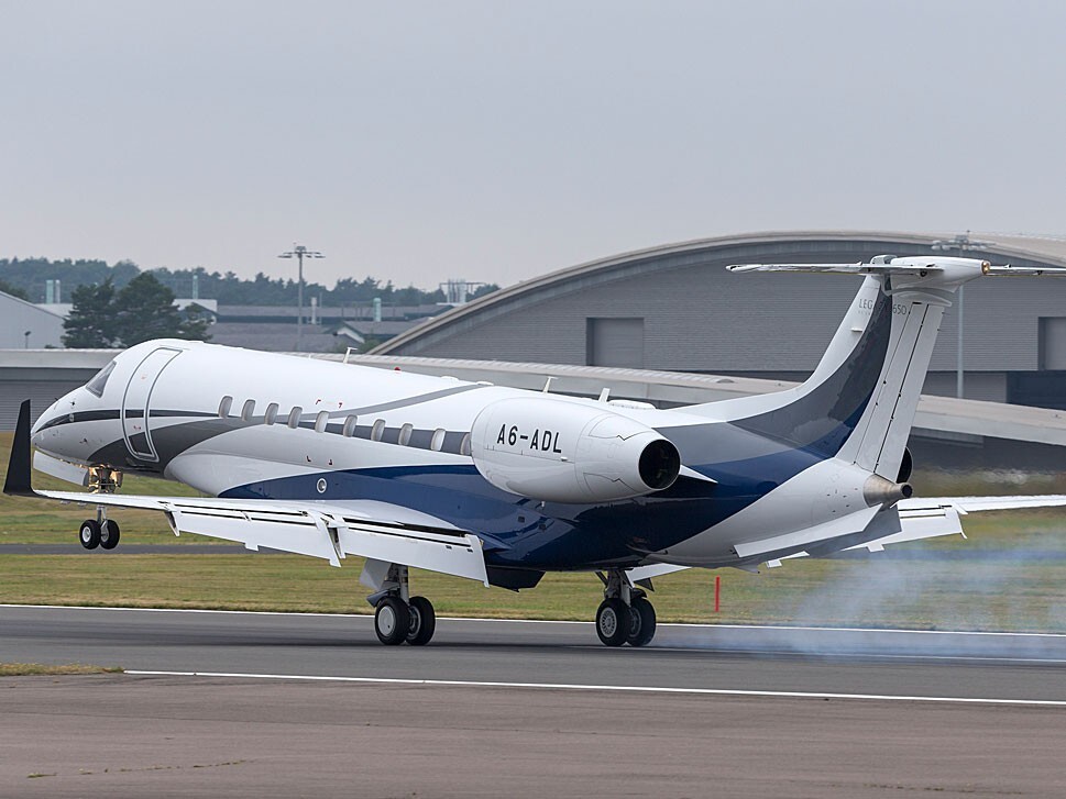 A Large Jet lands at Farnborough Airport UK