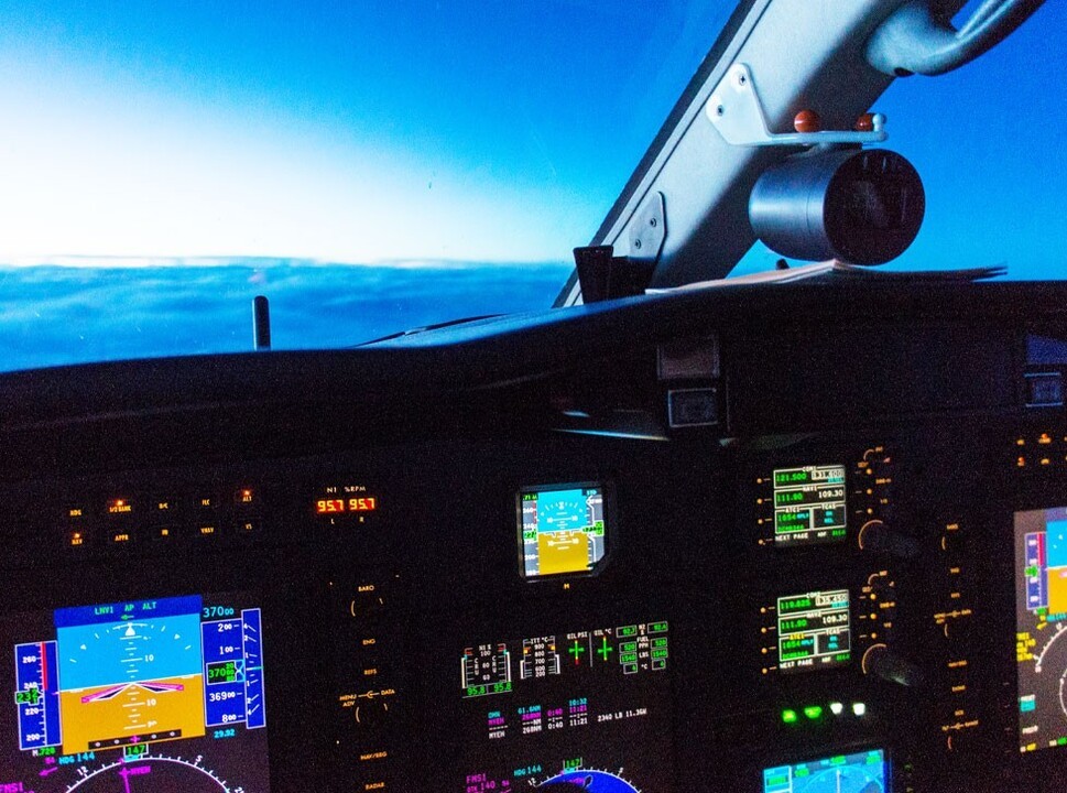 Private jet avionics panel during flight