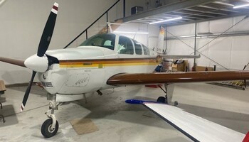 Beechcraft G33 Bonanza In Hangar