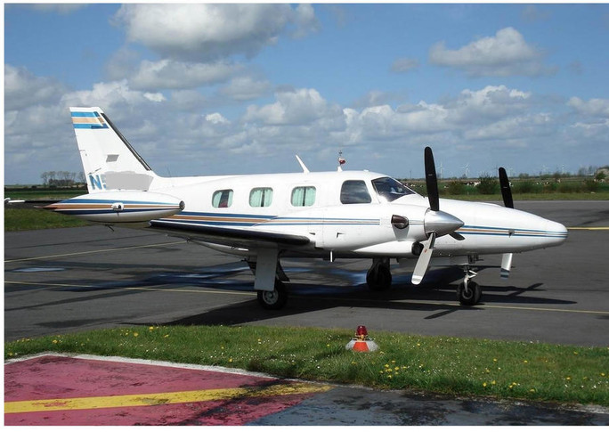 1981 piper cheyenne parked on airfield 